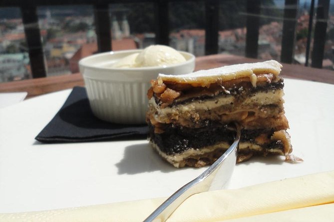 Slovenian culinary experience in Ljubljana - small group - tour - Visiting the Triple Bridge and Old Town Landmarks