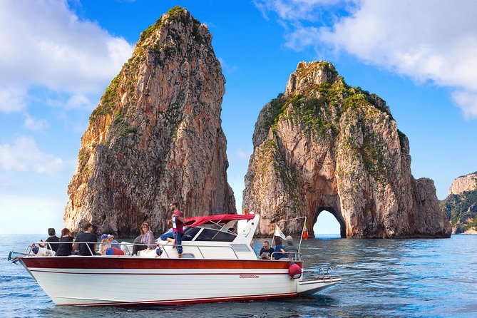 Small Group Boat Day Excursion to Capri Island from Amalfi - Iconic Capri Landmarks: Natural Arch and Faraglioni Views