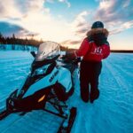 Snowmobile and Ice Fishing Experience - Snowmobiling through Lappish Forests