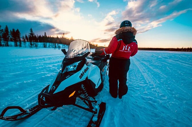 Snowmobile and Ice Fishing Experience - Snowmobiling through Lappish Forests