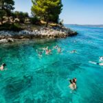 Split: Blue Lagoon & Trogir Boat Tour with Lunch and Drinks - Tasting Lunch: Chicken Salad and Fresh Fruits