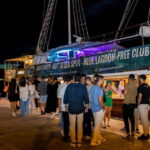 Split: Boat Crawl with Nightclub Access, Shots, & Boat Party - The Sunset Boat Party with Live DJ and Views
