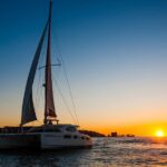 Sunset Catamaran in Lisbon | Music and Open Bar - Approaching the Cristo Rei Statue and South Bank Views