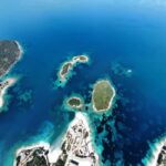 Sunset Sailing to Ksamil Islands with Fruits and Drinks - The Comfortable Power Boat and Snorkeling Equipment