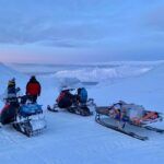 Svalbard: Snowmobile Adventure and Ice Cave Exploration - Returning Through the Arctic Landscape