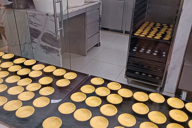 Taste Lisbon: The Ultimate Full Meal Portuguese Food Tour - Exploring Portuguese Cheeses and Cold Cuts at Praça Luís de Camões