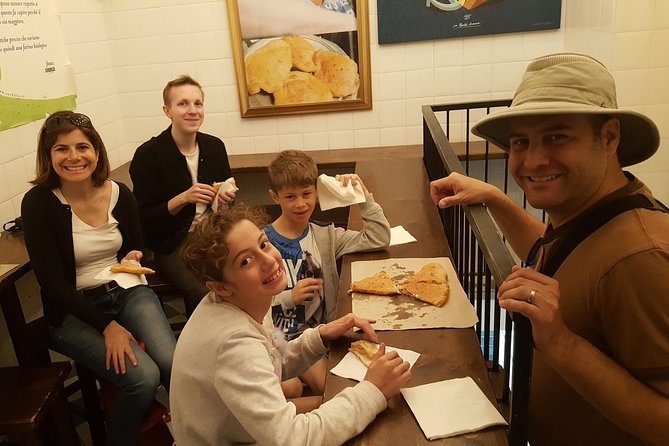 Tasty Naples Street Food Tour of MustEat Gourmet Specialties and MustSee Sites - Walking through Via Dei Tribunali: Sampling Frittattine and Arancini