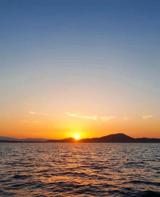 Tavolara: Sunset Aperitif Tour with Drinks and local snacks - Starting Point and Departure Details in Porto San Paolo