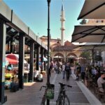 Tirana Walking Tour, Extra Virgin Olive Oil and Raki Tasting - Exploring Murat Toptani Pedestrian Street and Its Landmarks