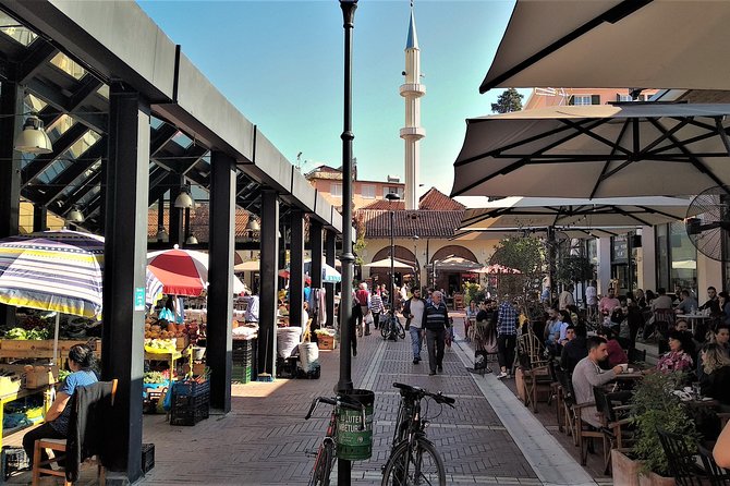 Tirana Walking Tour, Extra Virgin Olive Oil and Raki Tasting - Exploring Murat Toptani Pedestrian Street and Its Landmarks
