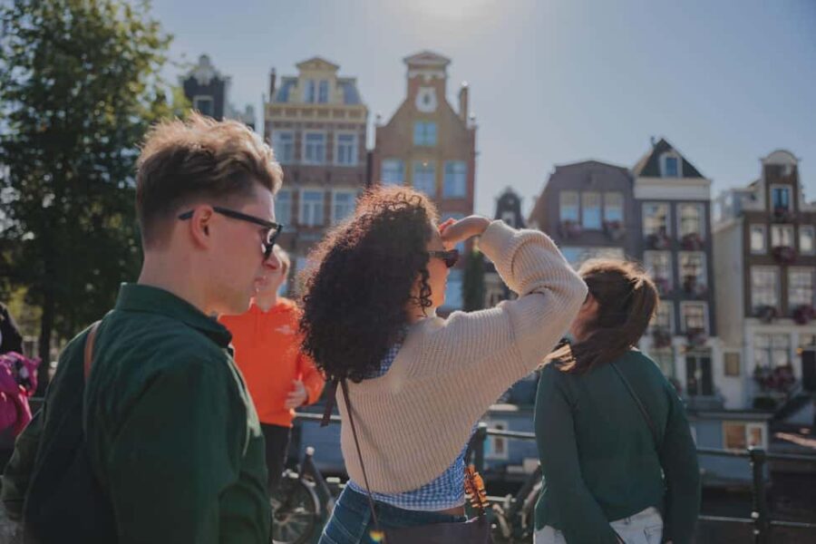 Top 10 Tastes of Amsterdam: Guided Walking Food Tour - Walking Through Amsterdam’s Historic Neighborhoods and Canals