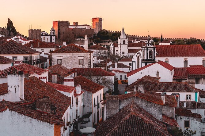 Tour from Lisbon: Obidos, Nazaré and Fátima Small Group - Exploring Óbidos: The Medieval Village and Its Castle