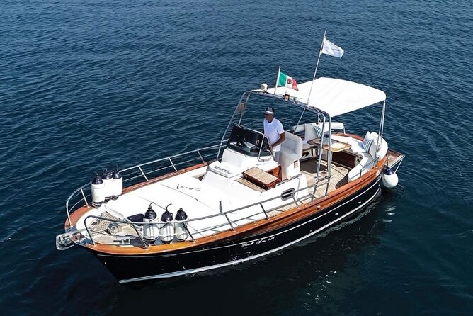 Tour La Dolce Vita stops for swimming, Snorkeling and Prosecco - Navigating the Gulf of Angels and Dolphin Spotting