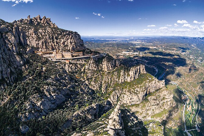 Train Journey from Barcelona Shared Tour in Montserrat - Ascending Montserrat Mountain by Cog-Wheel Train or Aeri Cable Car