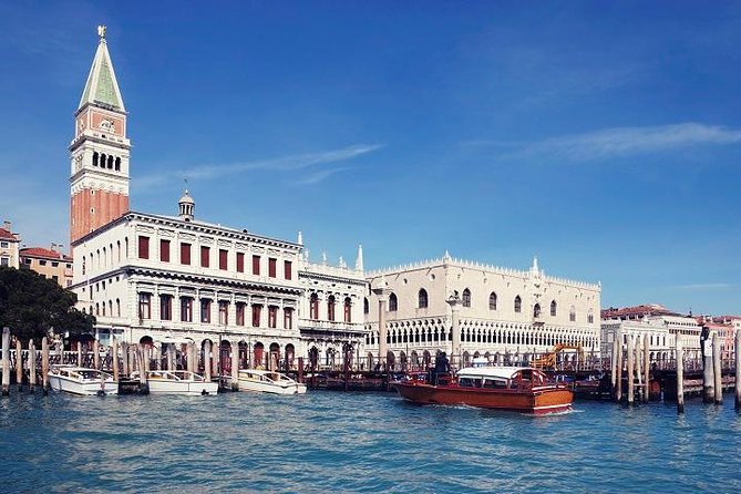 Venice from Rome: Full Day Semi-Private Tour by Fast Train - Walking the Historic Rialto Bridge and Market