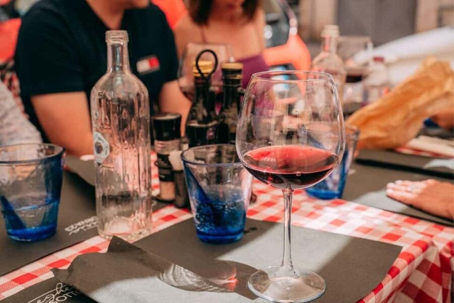 Verona: Guided Food Walking Tour with Amarone Wine tasting - Wine Tasting at Ponte Pietra with Artisanal Gelato