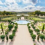Versailles Palace Guided Tour with Gardens, Trianons & The Hamlet - Discovering the Gardens of Versailles in Detail