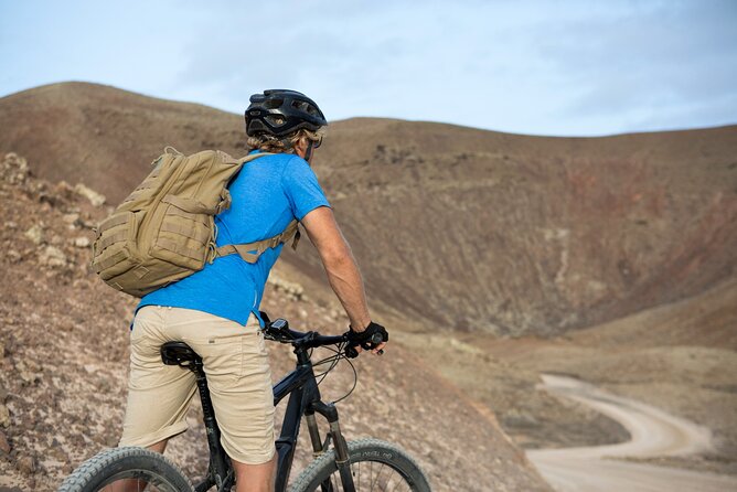 Volcanic Discovery PREMIUM eBike Tour; easy level: 35 km - The Stops and Highlights: Volcano, Village, Beaches