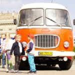 Warsaw: Highlights Guided Retro Bus Tour - Starting at the Palaces of Culture and Science