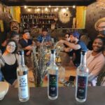 2 Island Adventure: Contoy & Mujeres with Snorkeling & open bar - Visiting Isla Mujeres: Colorful Town and Beach Relaxation