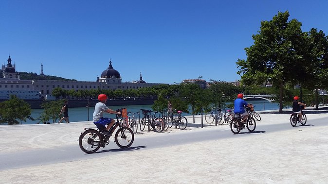 2h - Electric Bike Tour of Lyon with a Local Guide - Pedaling Through Place Bellecour