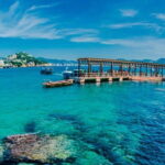 Acapulco: Crystal Bottom Boat Tour to La Roqueta Island - Starting the Adventure with a Glass-Bottom Boat in Acapulco