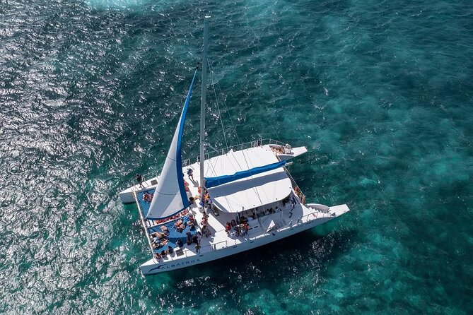 Adults-Only Sunset Catamaran Cruise to Isla Mujeres - Water Activities: Snorkeling at El Meco and Swimming at Blanquizal