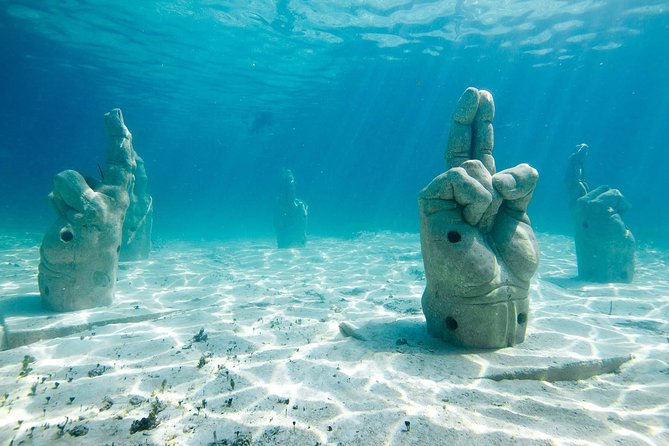 Afternoon Half-Day Catmaran Sailing and Snorkel Adventure - Snorkeling in Cancun’s Reefs