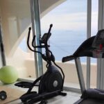 Akrotiri: Couples Departure Day Treat w Massage & Day Pool Access - Pool Access and Relaxation in Santorini