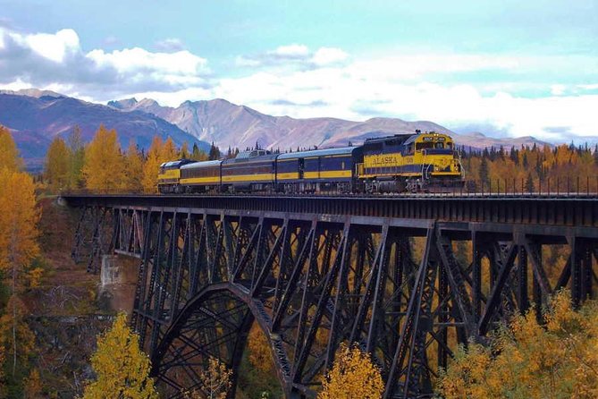 Alaska Railroad Anchorage to Denali One Way - Crossing the Knik River with the Chugach Mountains as a Backdrop