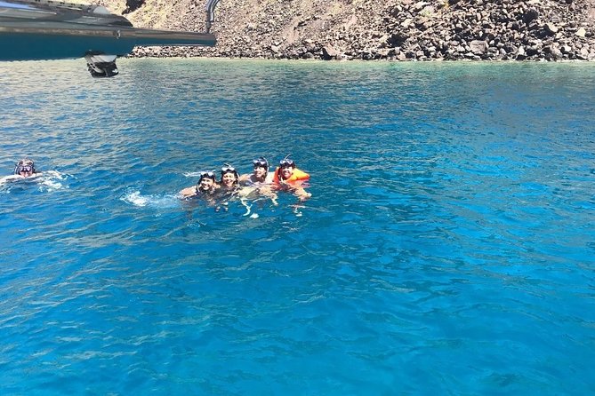 All-Inclusive: Santorini Luxury Sunset Cruise with Greek Meal - Swimming and Snorkeling at Red Beach and Mesa Pigadia