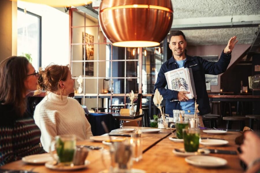Amsterdam: Albert Cuyp Market and De Pijp Guided Foodie Tour - Walking Through the Albert Cuyp Market