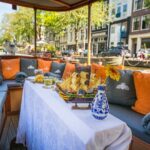 Amsterdam Canal Cruise in Classic Salon Boat With Drinks and Cheese - Seamless Booking and Availability