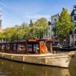 Amsterdam Classic Saloon Boat Cruise, Drinks and Cheese Option - Starting Point and Departure Logistics in Central Amsterdam