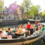 Amsterdam: Guided Open Boat Cruise Unlimited Drinks Option - Starting Point and Duration for a Relaxed Sightseeing Experience