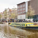Amsterdam: Historic City Sightseeing Canal Cruise - Navigating Amsterdams Historic Canals and Bridges