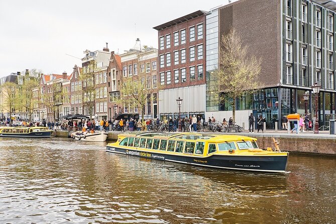 Amsterdam: Historic City Sightseeing Canal Cruise - Navigating Amsterdams Historic Canals and Bridges