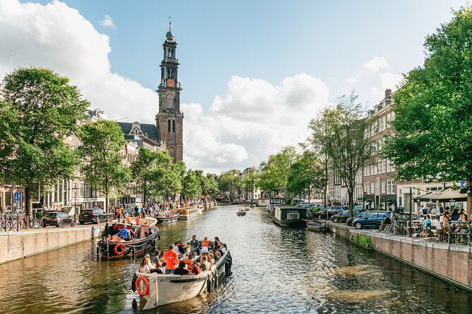 Amsterdam Luxury Open Boat Canal Cruise with Unlimited Drinks - The Electric Boat Experience in Amsterdam’s Waterways