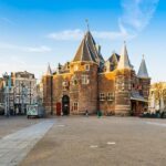 Amsterdam: Red Light District 1-hour Smartphone Audio Tour - Detailed Tour Stops: From Dam Square to Nieuwmarkt