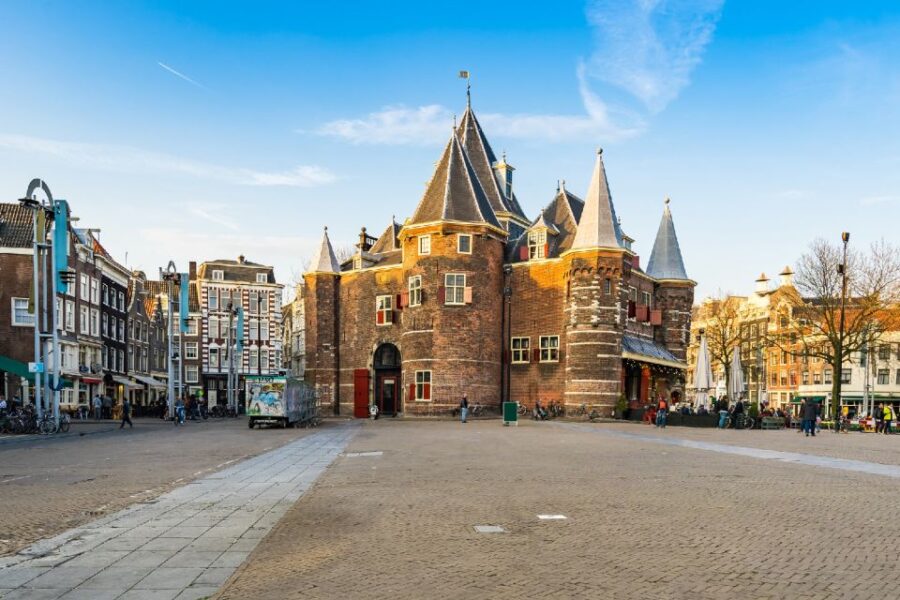 Amsterdam: Red Light District 1-hour Smartphone Audio Tour - Detailed Tour Stops: From Dam Square to Nieuwmarkt