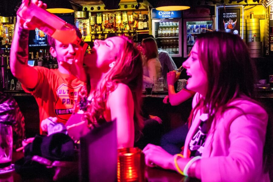 Amsterdam: Red Light District Pub Crawl with Unlimited Shots - Practical Details: Meeting Points and Dress Code