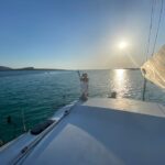 aperitifs at sunset on the Stintino catamaran burianaCharter - Scenic Views of the Asinara Park from the Sea