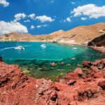 Archaeological bus tour to Akrotiri excavations & Red beach - Red Beach: Colorful Cliffs and Free Time for Swimming