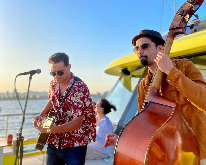 Barcelona: Daytime or Sunset Catamaran Cruise with Music - Live Music and Sunset Magic from July to September