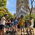 Barcelona Sagrada familia Electric Scooter or E-Bike Tour - Riding Through Barcelona’s Coastal Charm at Playa de La Barceloneta