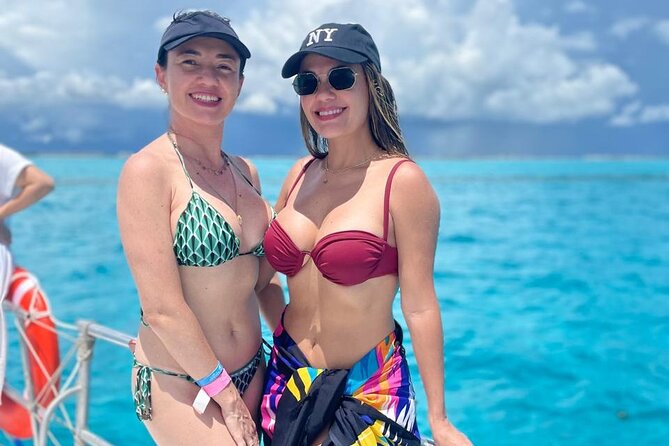 Best Catamaran Isla Mujeres tour with Open bar, lunch, snorkel - Setting Sail on a Luxurious Catamaran