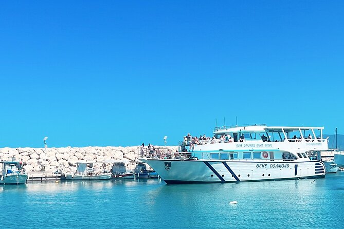 Blue Lagoon trip with slide & music departing from Latchi harbour - Exploring the Baths of Aphrodite and Manolis Bay