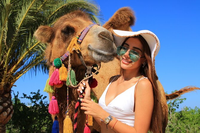 Camel riding experience on the shores of the Pacific Ocean - Scenic Trail Through Desert Terrain and Ocean Views
