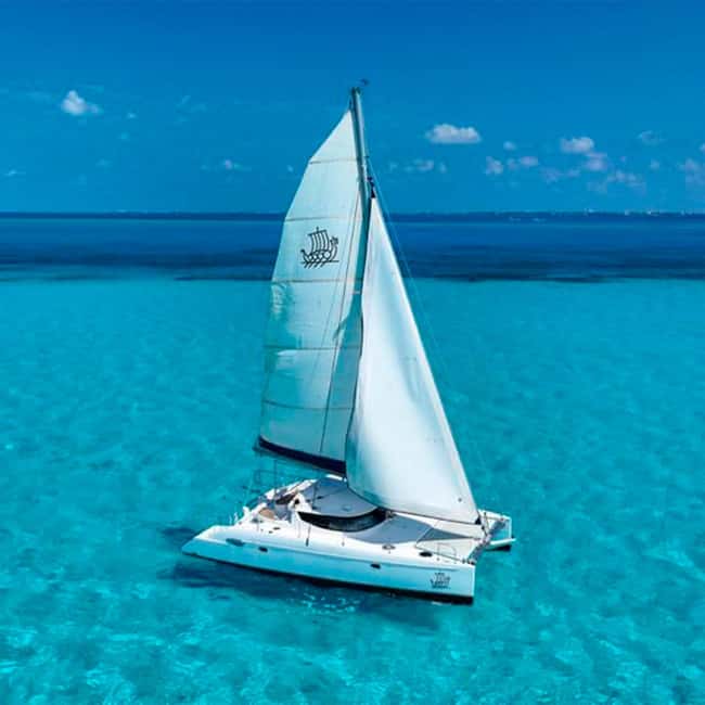 Cancun: Premium Catamaran with Transportation & Dock fee - Snorkeling at a Vibrant Coral Reef