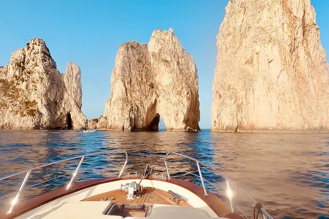 Capri by Boat private Comfortable tour - Scenic Route Past Capris Iconic Grottoes and Faraglioni
